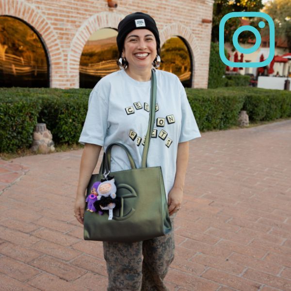 2 person standing in cute outfit with telfar bag and instagram logo overlay