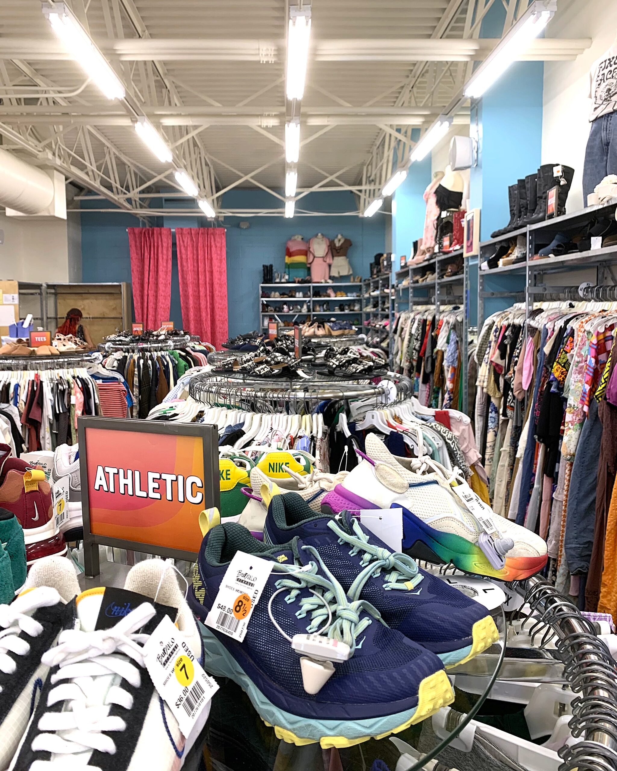 Houston store interior featuring shoe and clothing racks